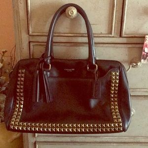 Coach black satchel handbag with brass studs